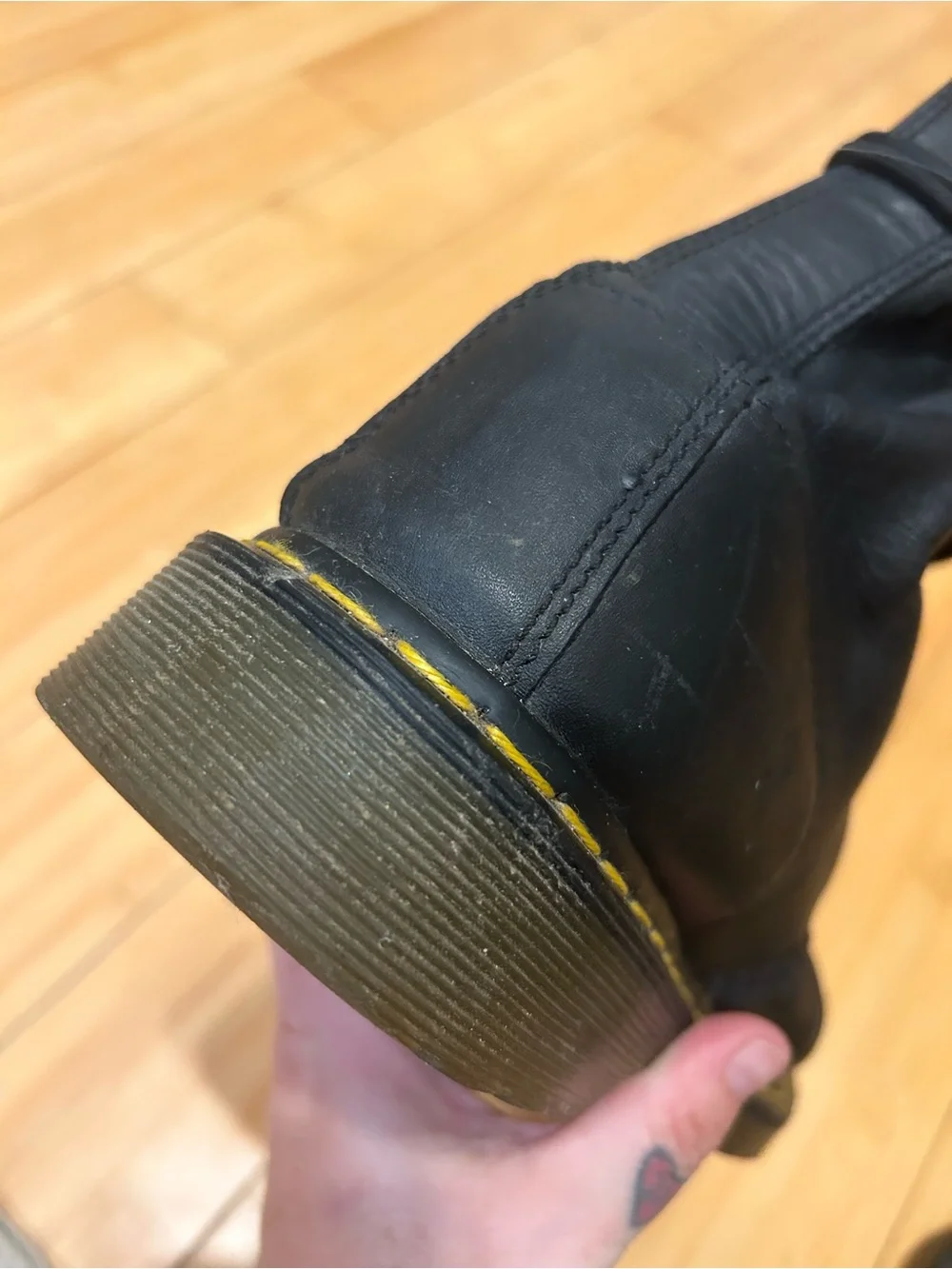 Dr. Martens Black Leather 8-Eye Lace-Up Boots with Yellow Stitching